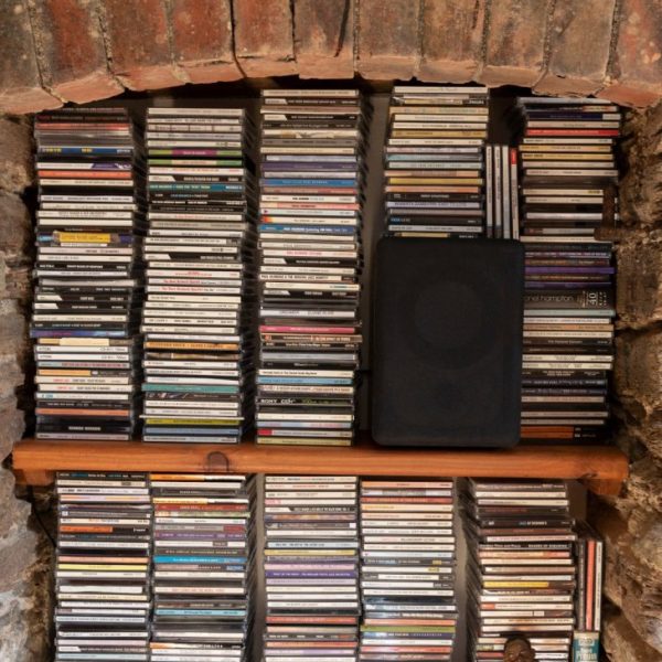 Bigbury, Devon, England, UK. 2022. Large collection of CD's in an alcove.